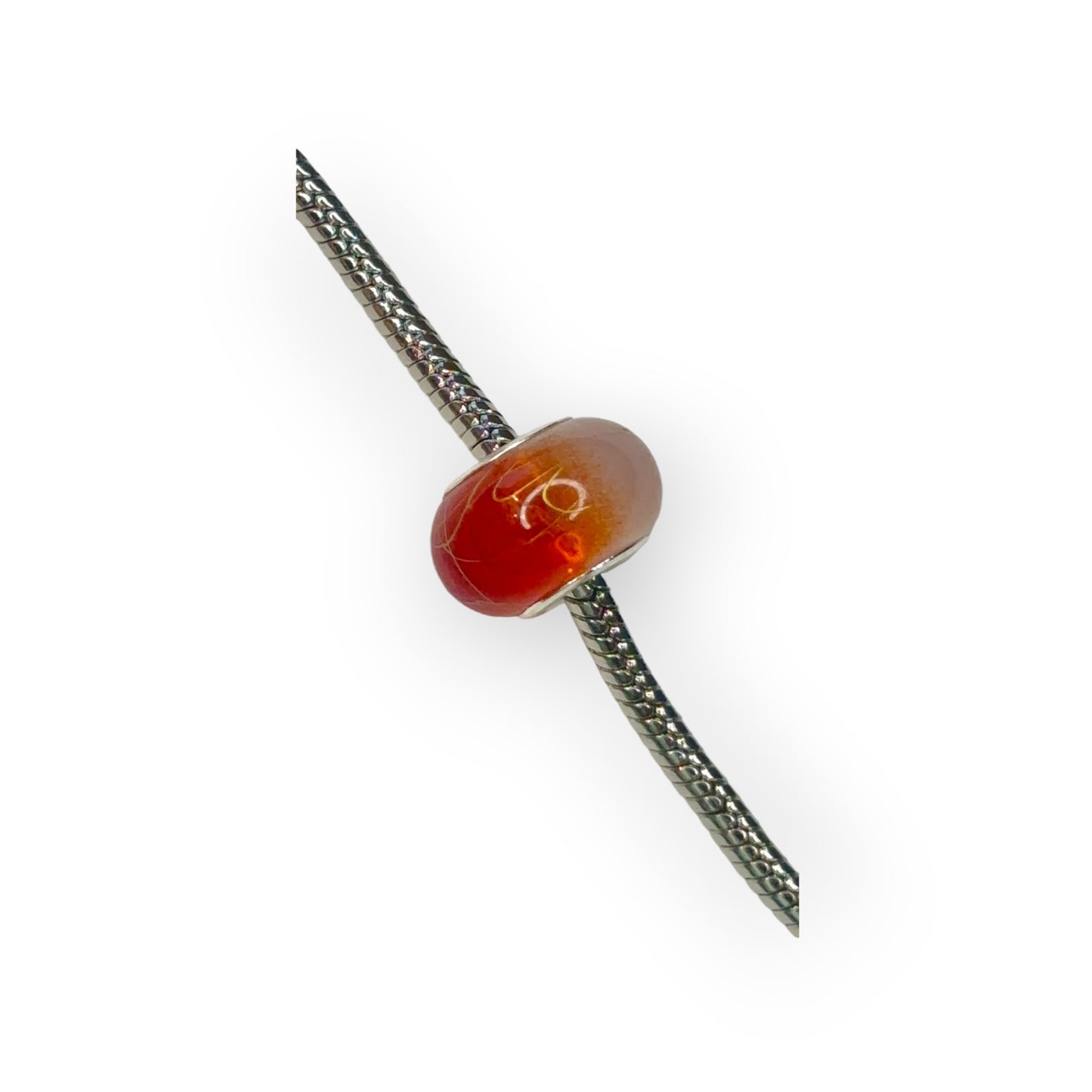 Charm esfera bicolor naranja motivos dorados