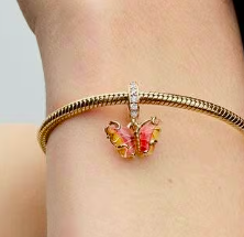 Charm Mariposa de Cristal Rosa y Amarillo