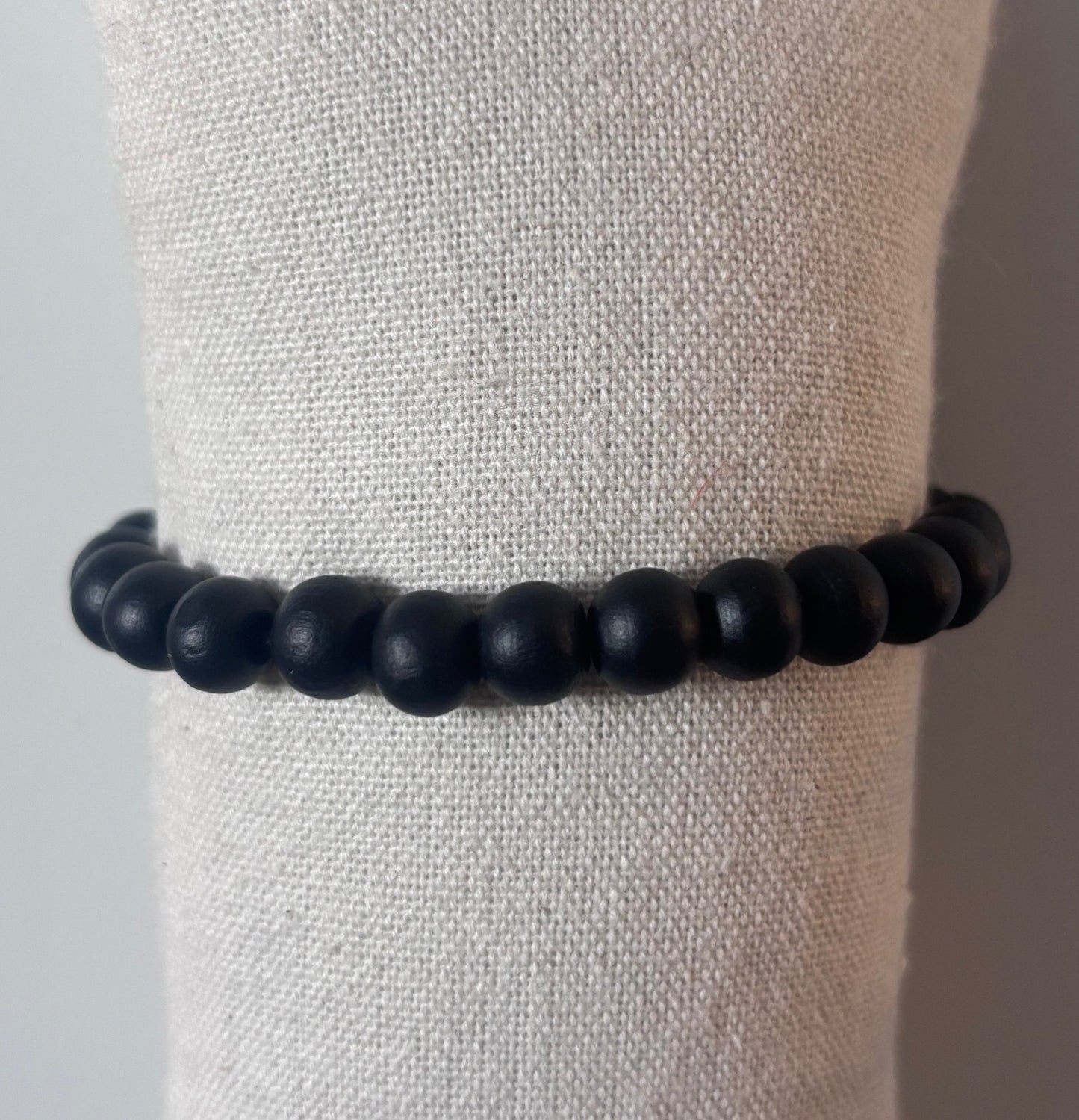 Pulsera de Bolas Negras – Minimalismo con Carácter