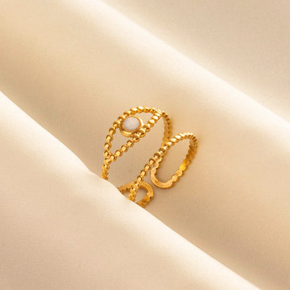 Anillos Dorados con Detalles Nacarados