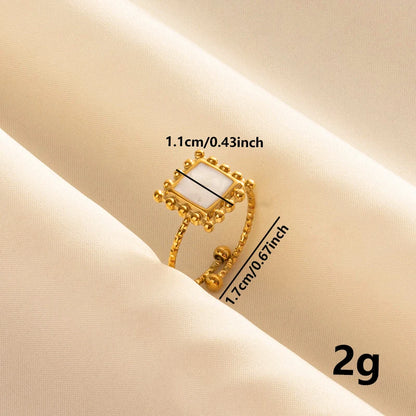 Anillos Dorados con Detalles Nacarados