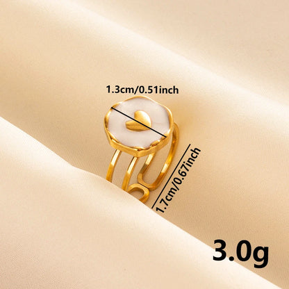 Anillos Dorados con Detalles Nacarados