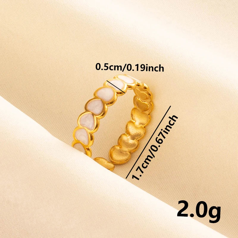 Anillos Dorados con Detalles Nacarados