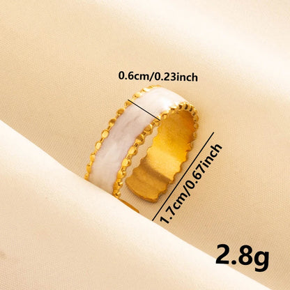 Anillos Dorados con Detalles Nacarados
