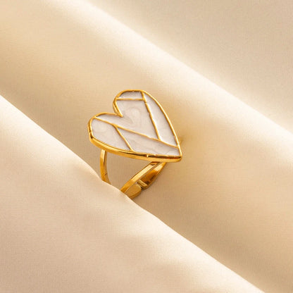 Anillos Dorados con Detalles Nacarados